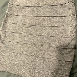 Body-con skirt with horizontal detailing and zippered back